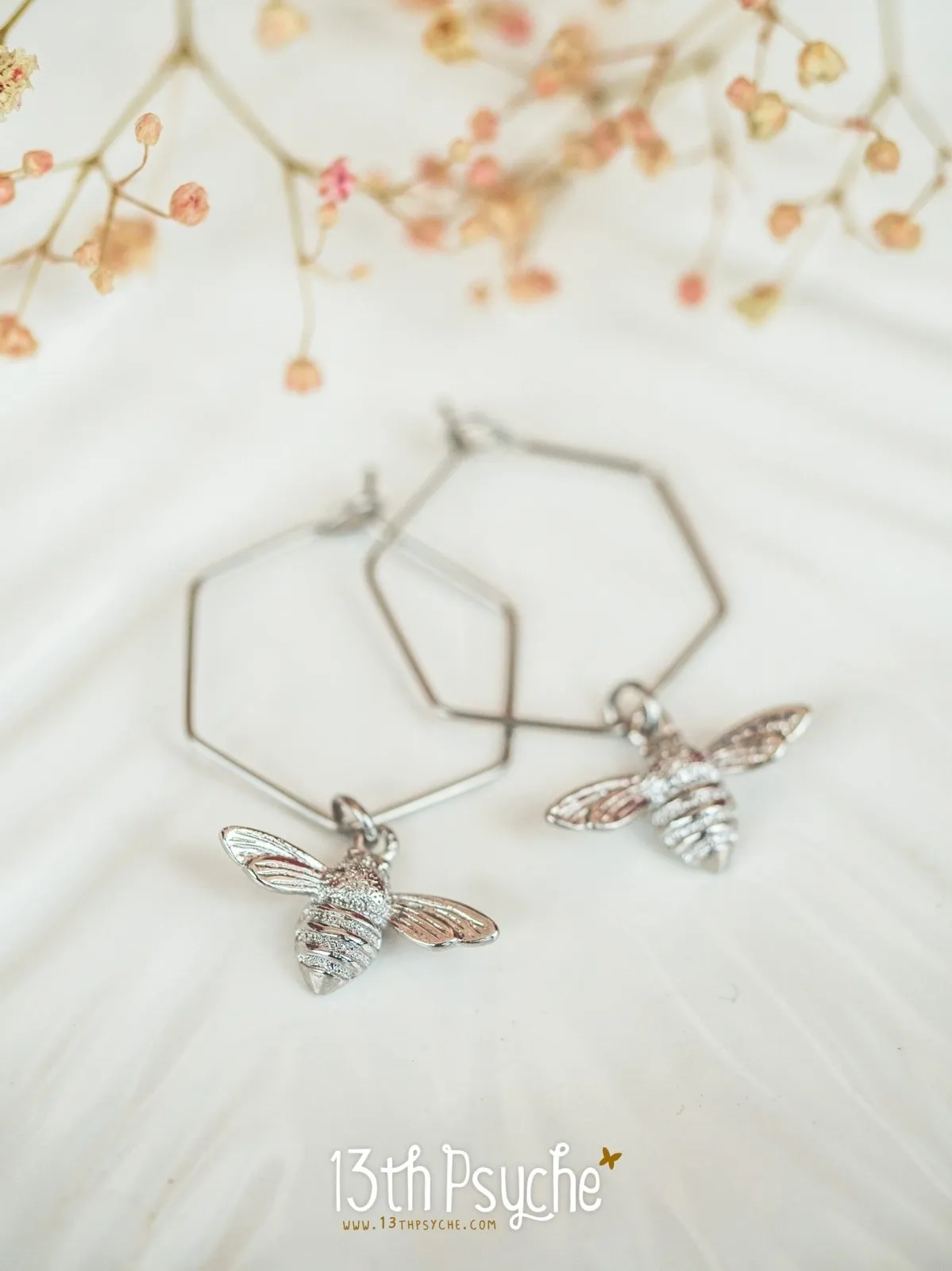 Hexagon hoop earrings with bee charms